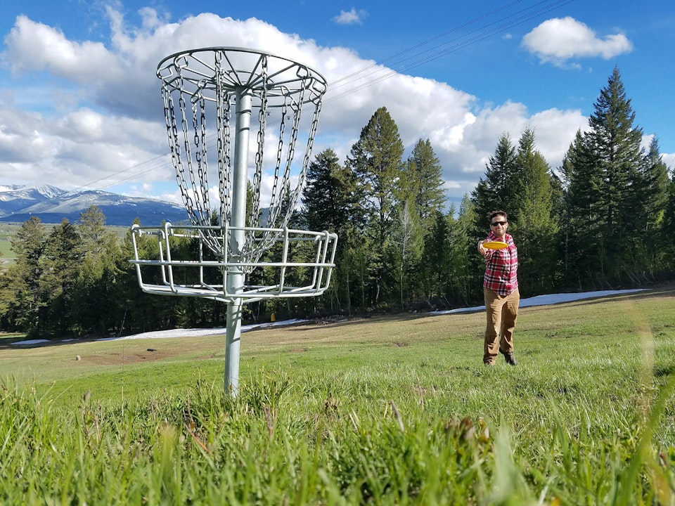 Having a blast throwing a disk into the basket