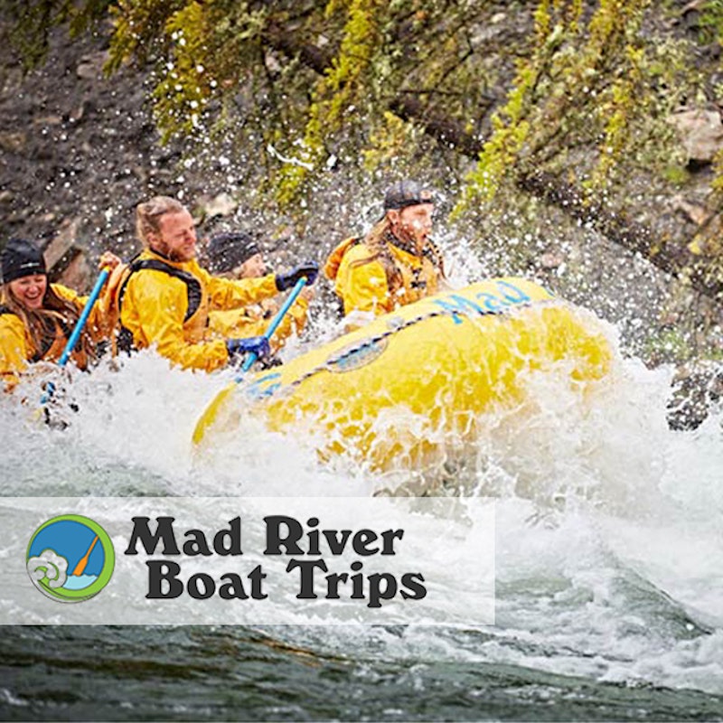 Group going through whitewater with Mad River