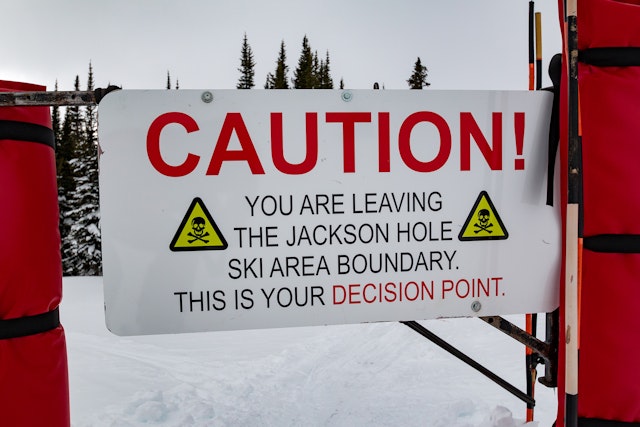 Caution sign on backcountry gates