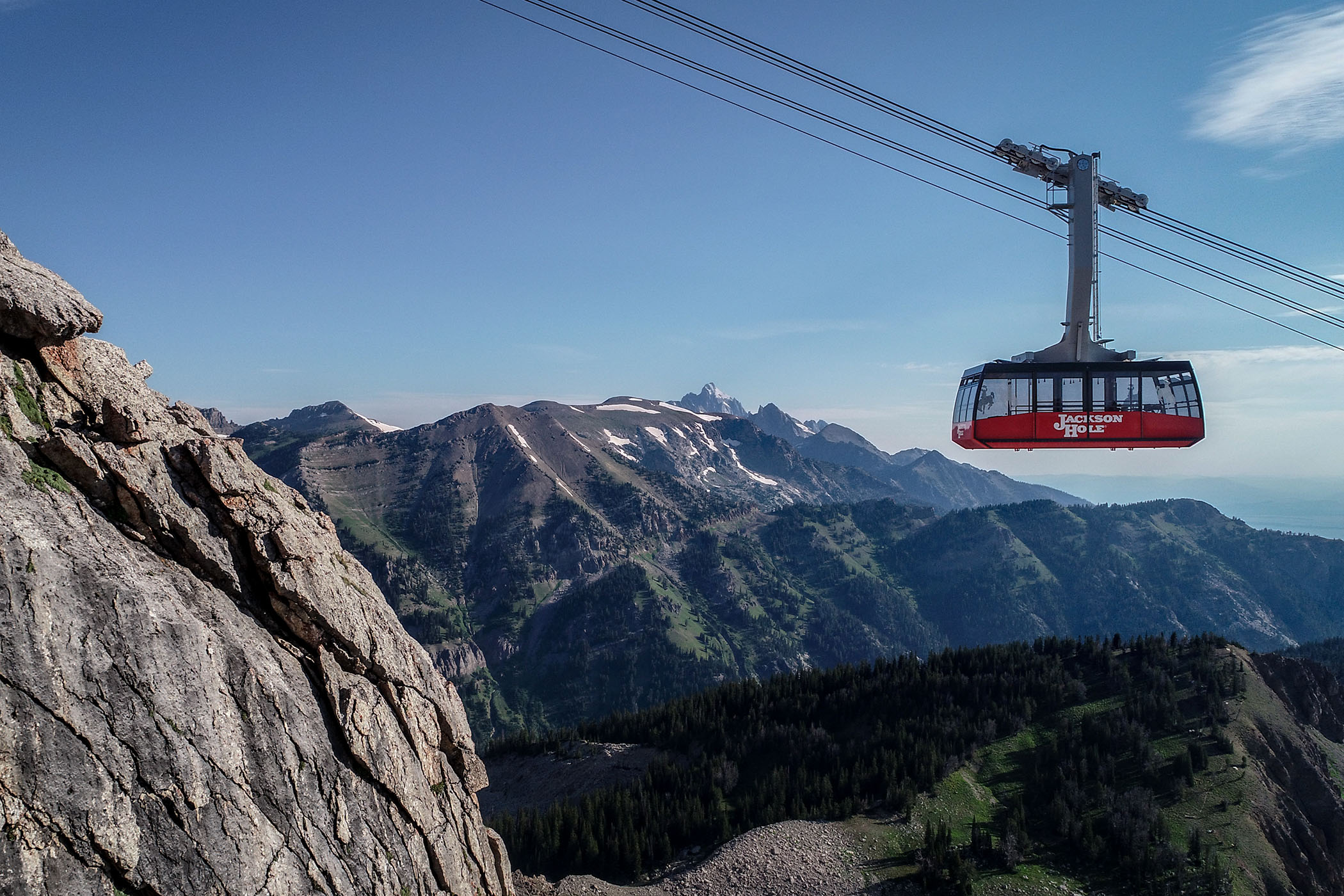 Tram going by Corbet's on a summer day