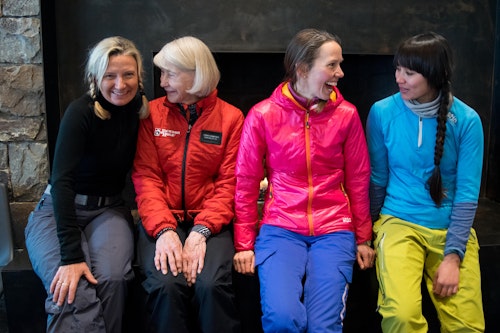 Group shot at Mindful Camp infront of a fireplace