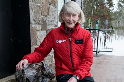 Headshot of Connie Kemmerer with a crystal
