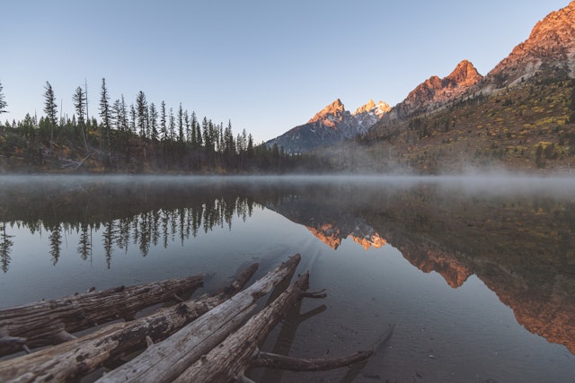 Fog coming off of the water at String Lake with Tetons in the background