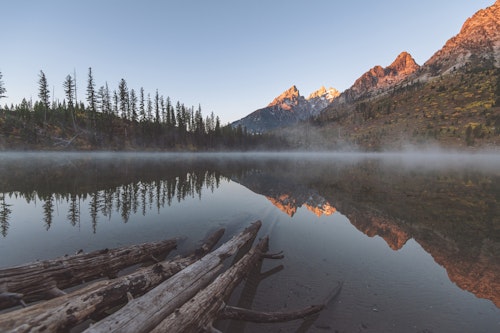 Fog coming off of the water at String Lake with Tetons in the background