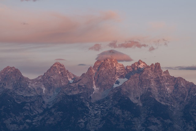 Scenic shot of the Tetons with a pink sunset