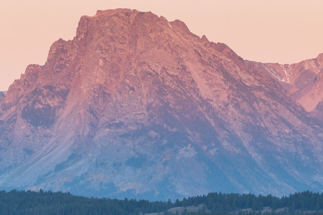 Shot of the Tetons with a pink sunset