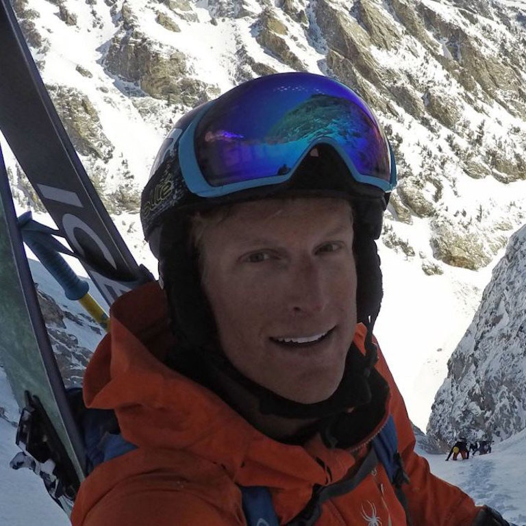 Owen Leeper hiking up a Couloir