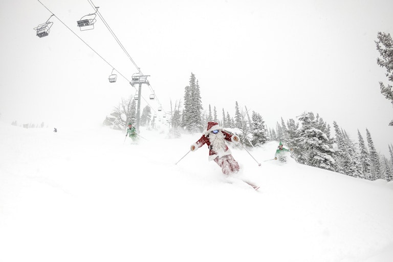 Santa skiing deep powder