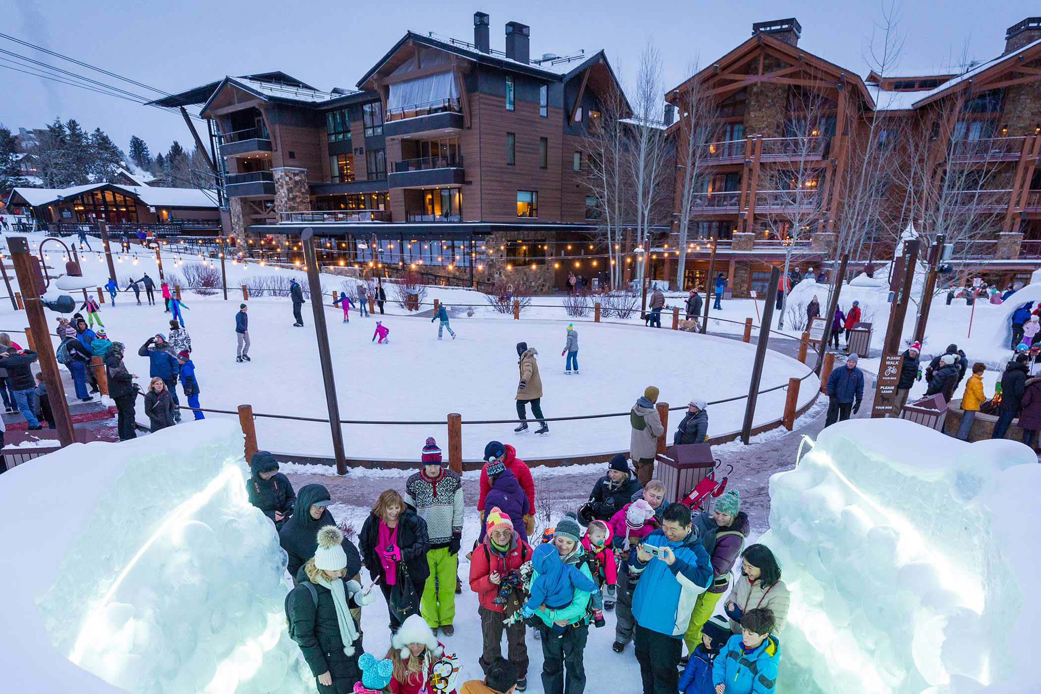 Families admiring lights of glow nights