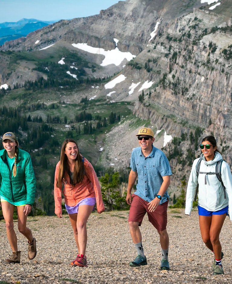 Five hikers walking up the mountain