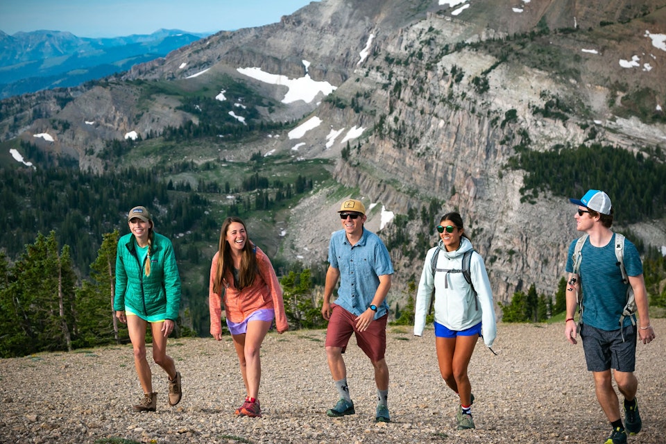 Five hikers walking up the mountain