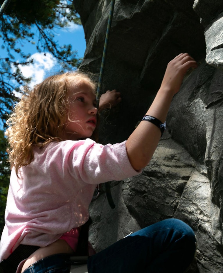 girl on rock climbing wall