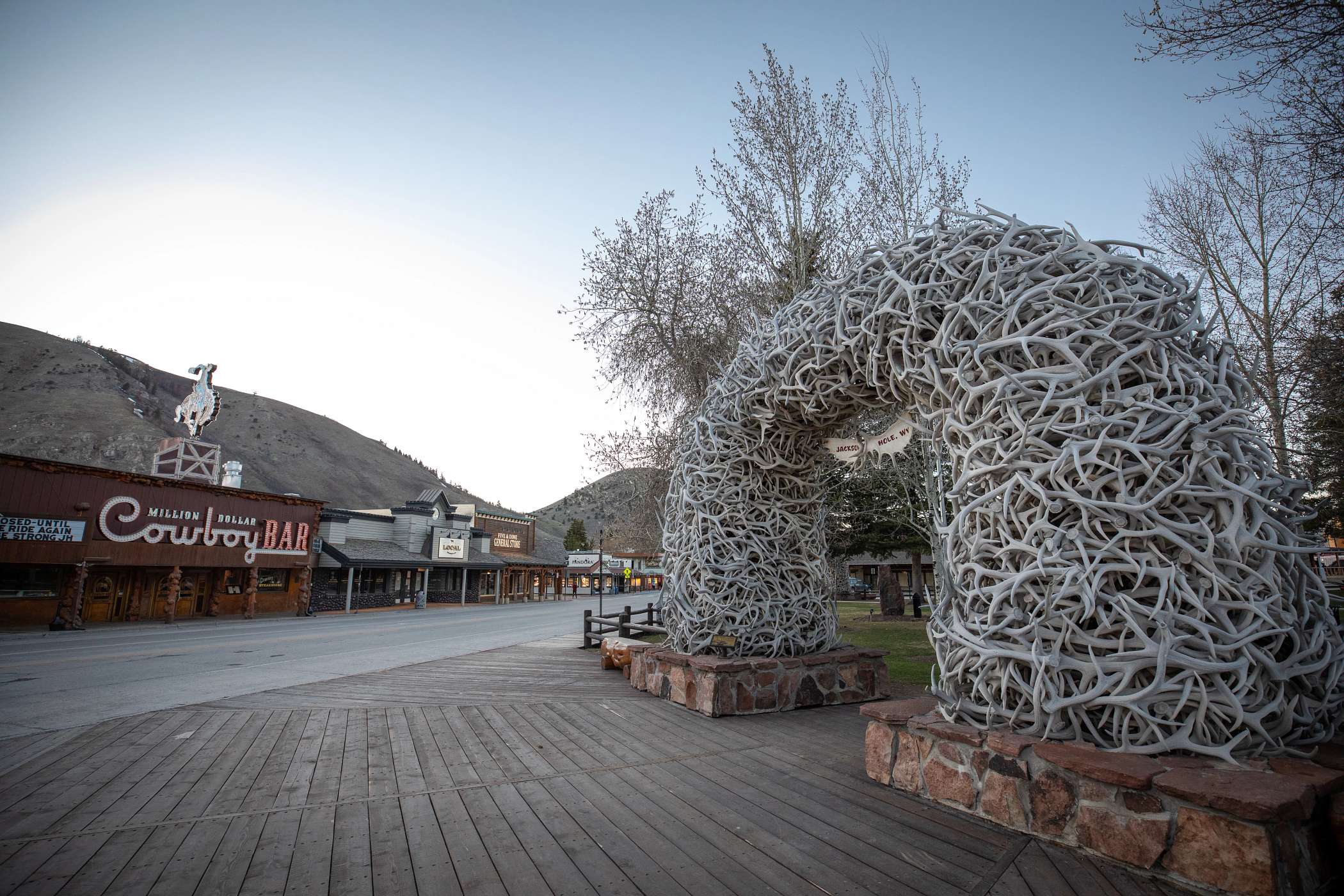 Antler arch in Jackson Town Square with the Cowboy Bar in the background