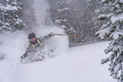 Skiing through powder
