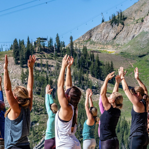 people doing yoga outside