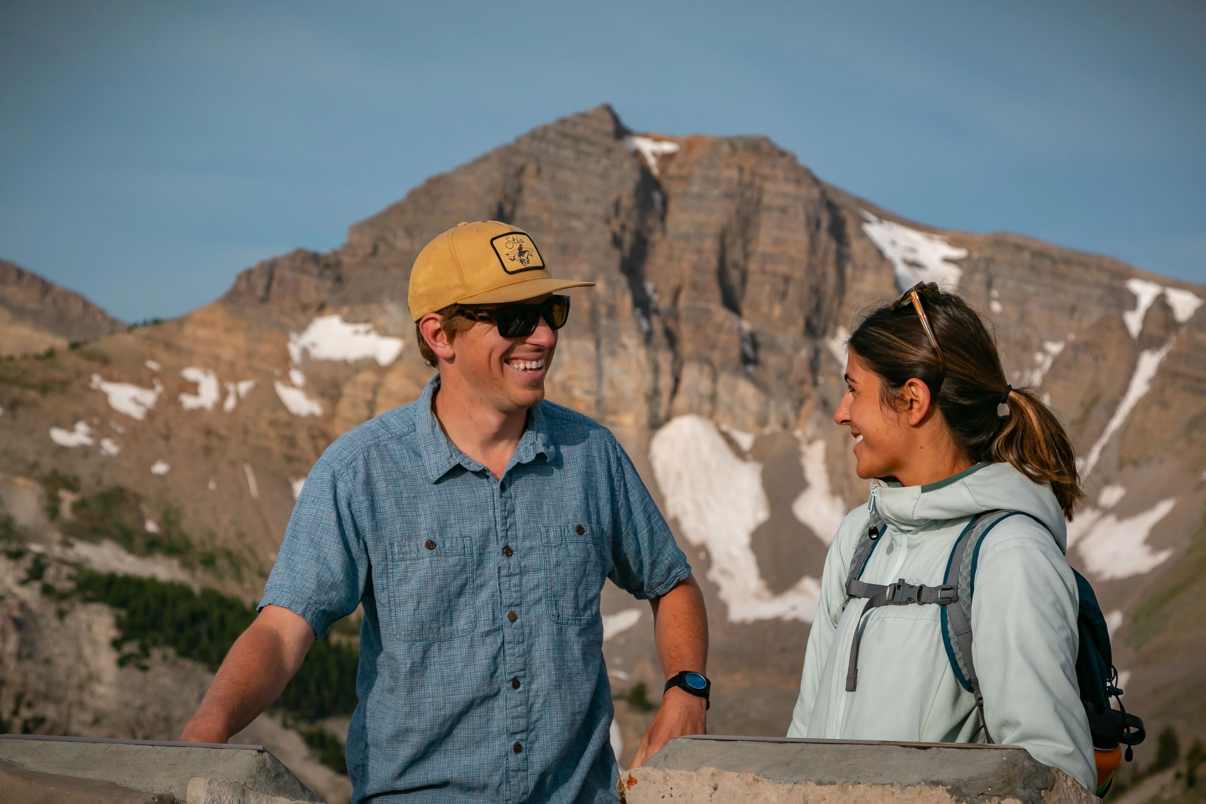 man and woman smiling at eachother