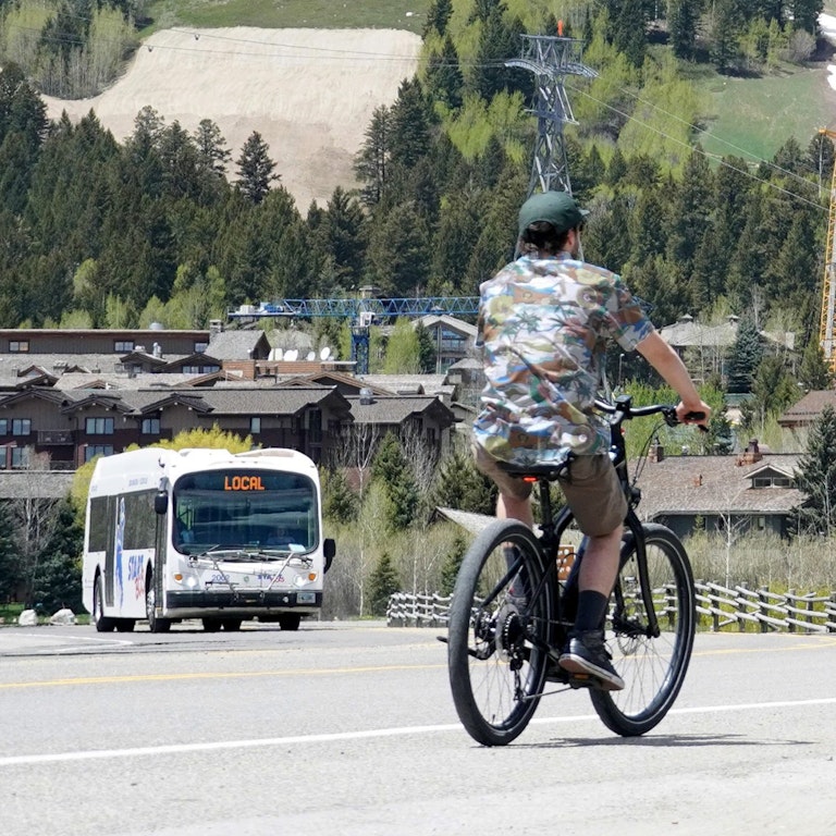 Biking into Teton Village with the START Bus leaving