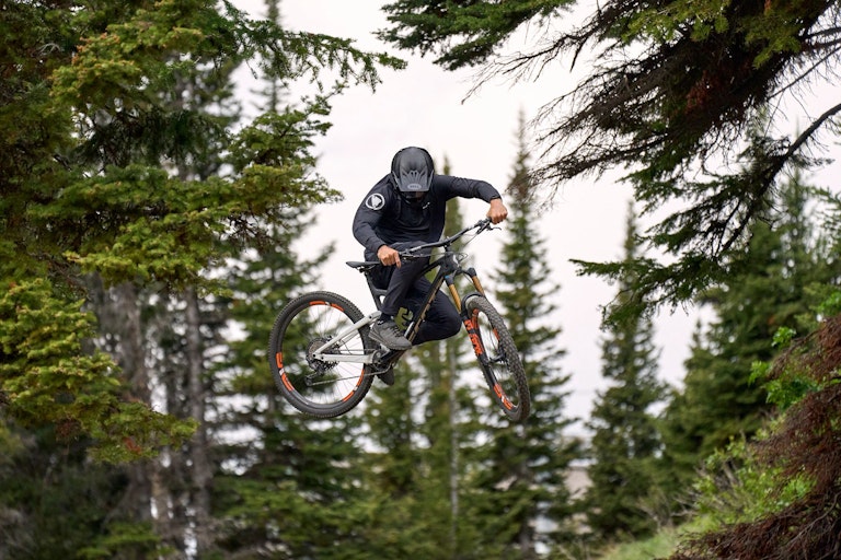 Person getting air on mountain bike