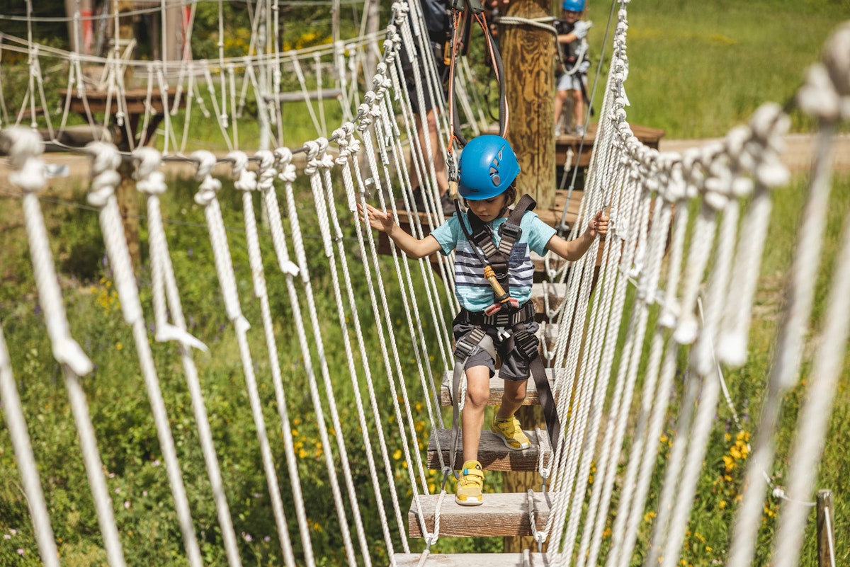 Boy enjoying the Aerial Ropes Course