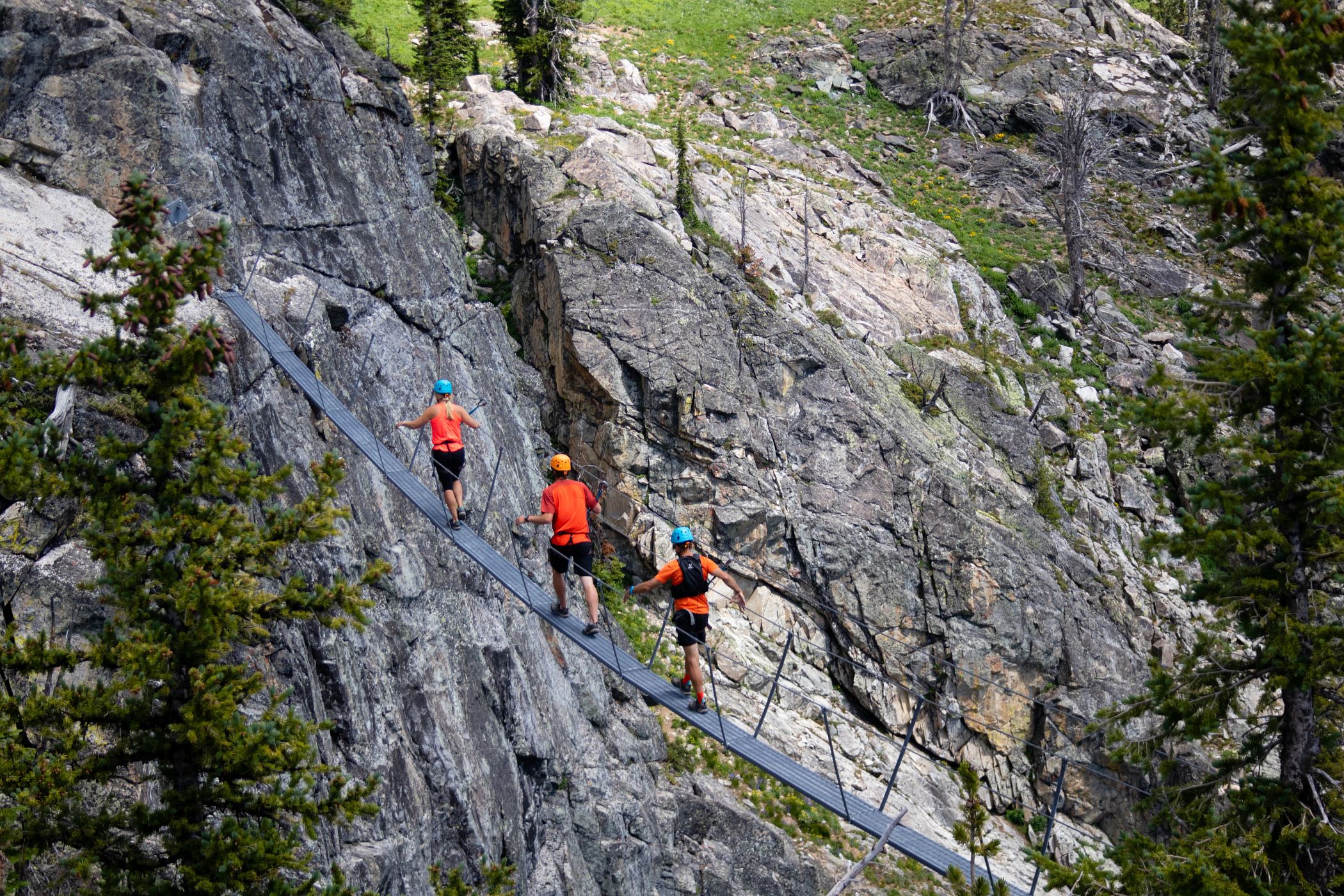 Group on a suspension bridge on the Via Ferrata