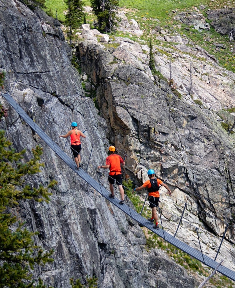 Group on a suspension bridge on the Via Ferrata