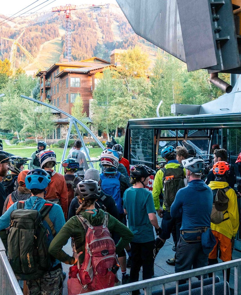 Bikers getting ready to load the tram