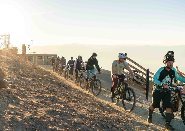 Bikers getting off the tram