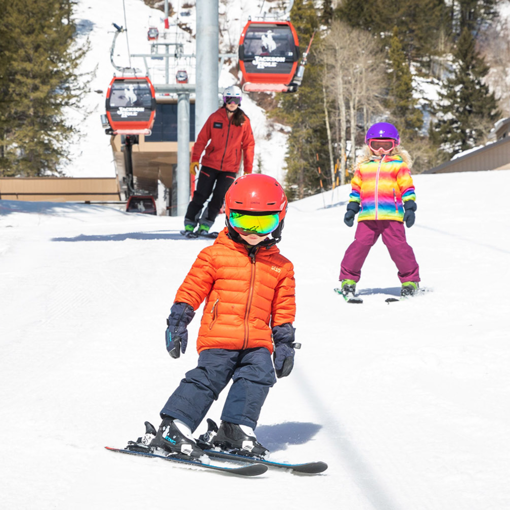 Two kids in ski lesson