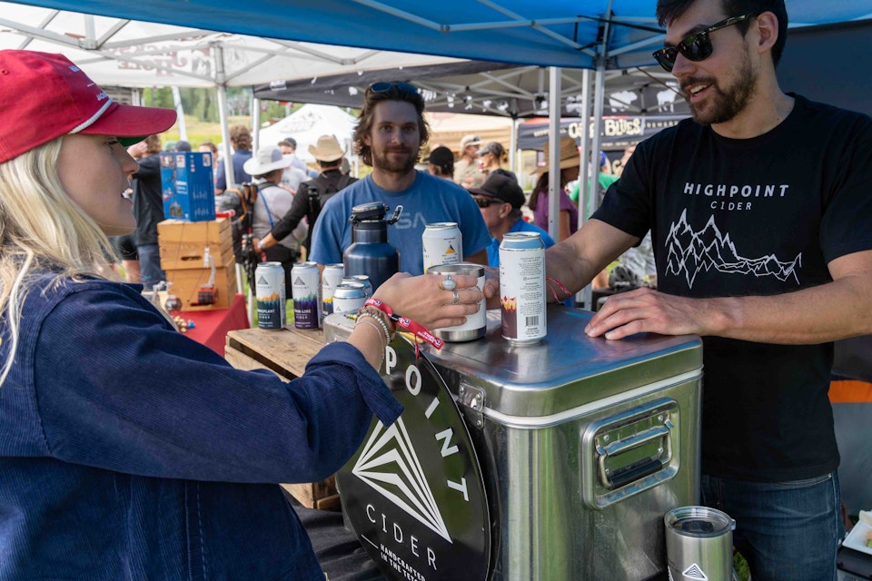 Trying beer at the Highpoint Cider stand at Bikes & Brews