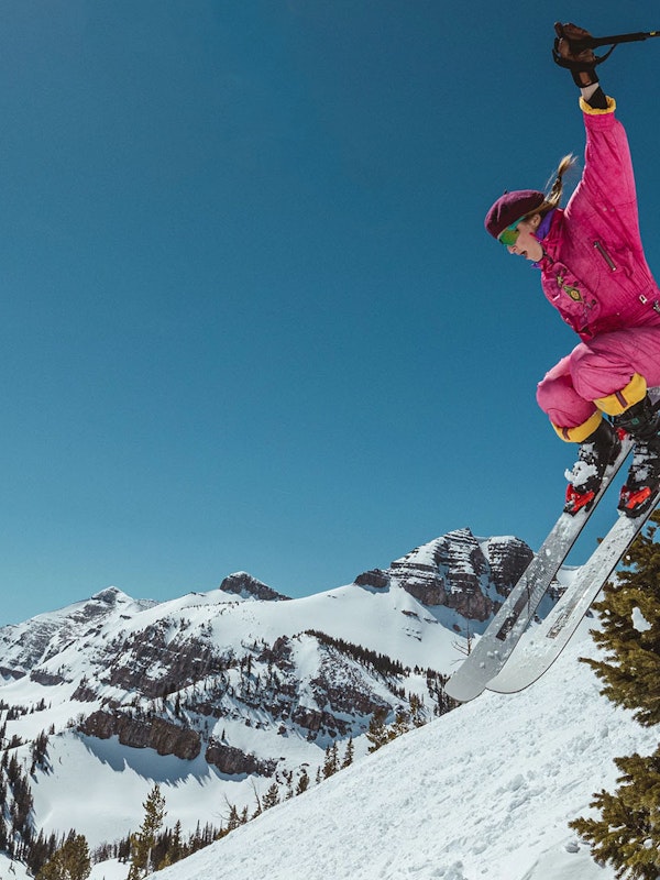 Jumping on skis with retro outfit