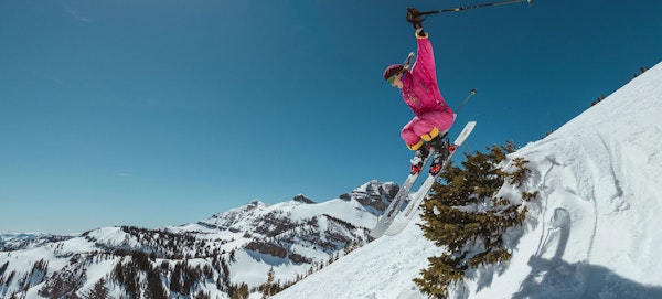 Jumping on skis with retro outfit