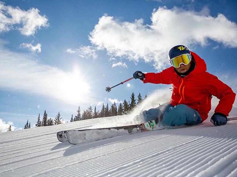 Skiing on groomed run