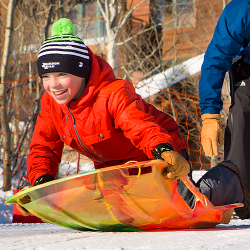 kid sledding