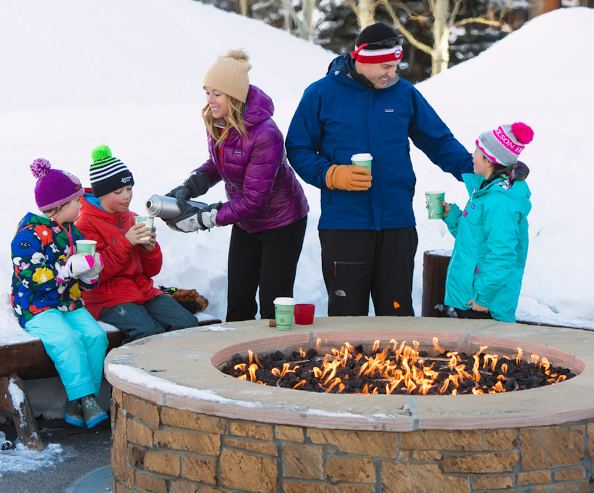 Family drinking hot chocolate at Solitude Station