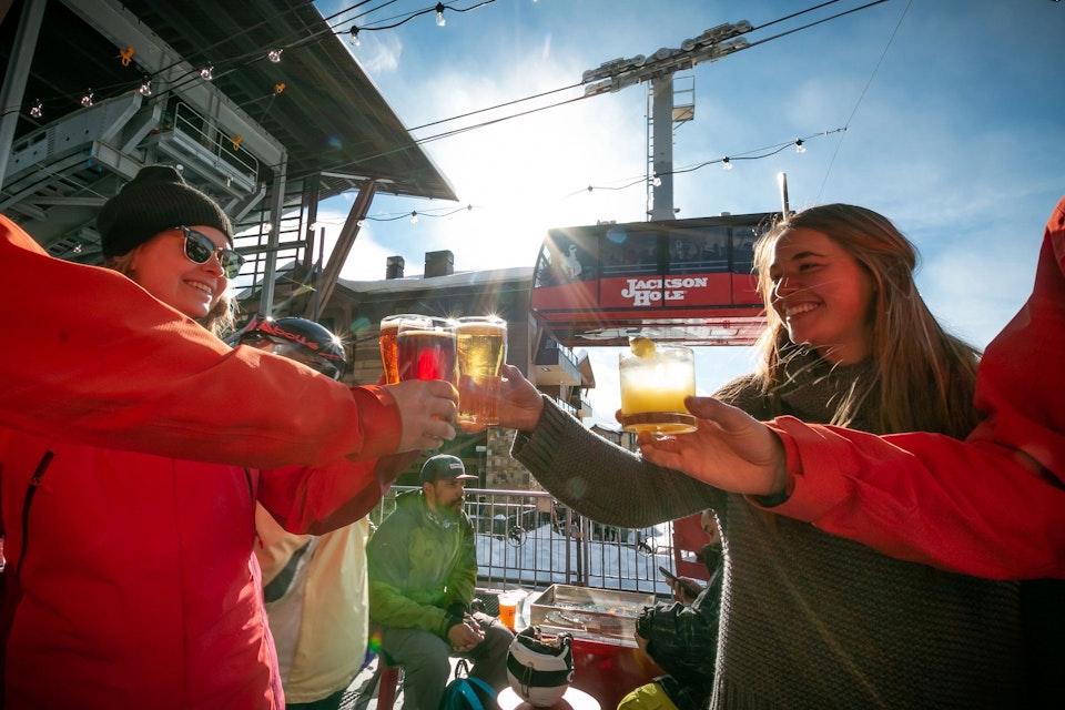 Cheersing drinks at RPK3 with Tram in background