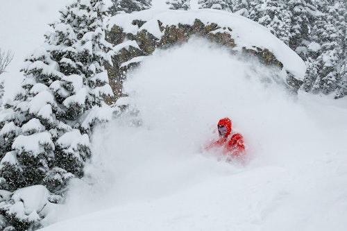 Snowboarding in powder