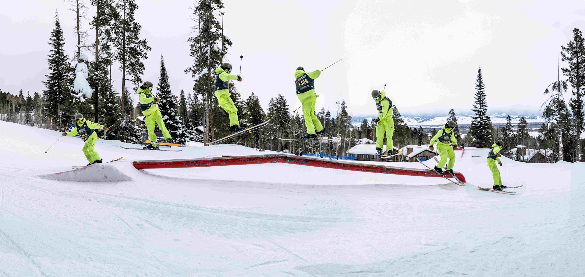 progression of skier doing a spin onto a rail