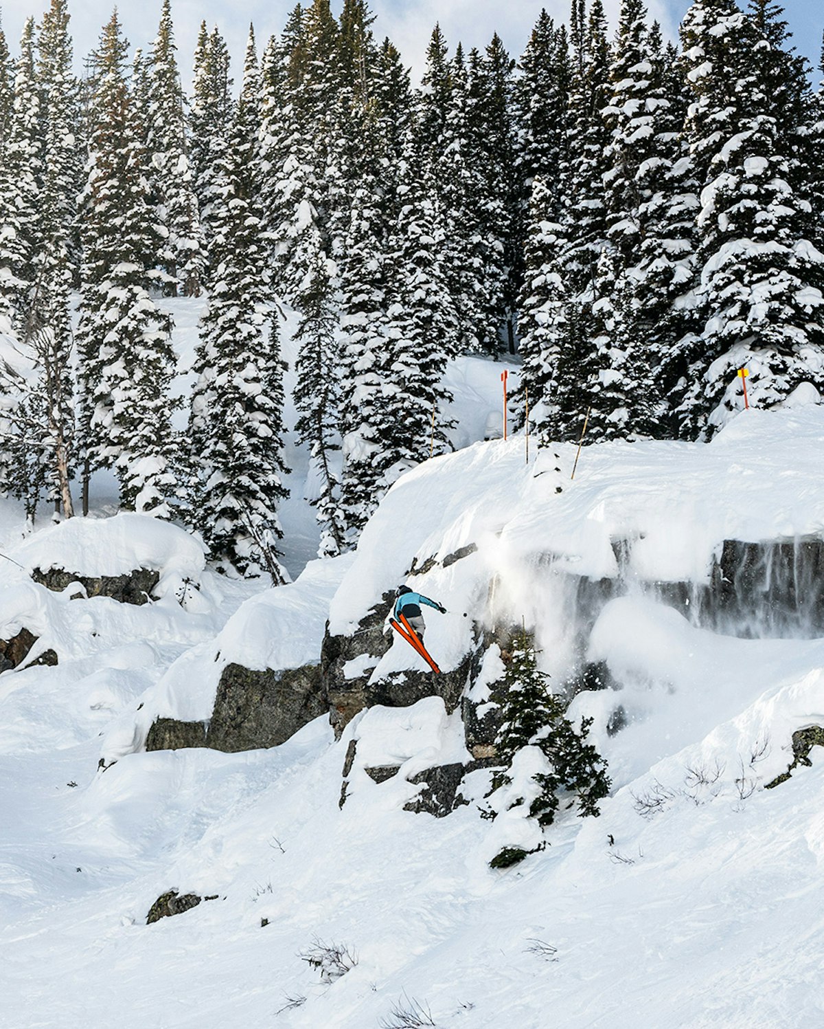 Skier sending it off a cliff
