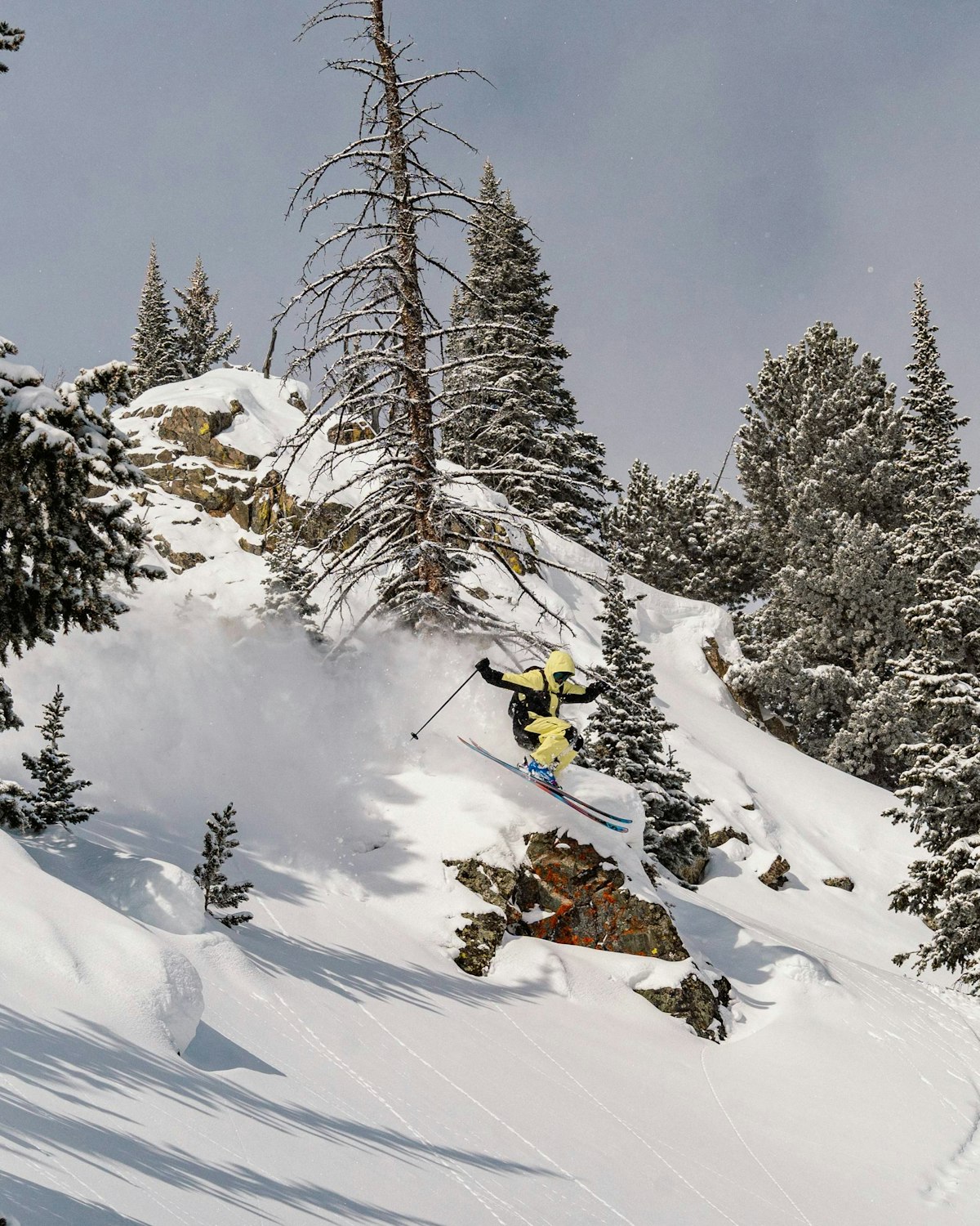 Skier getting air off a cliff