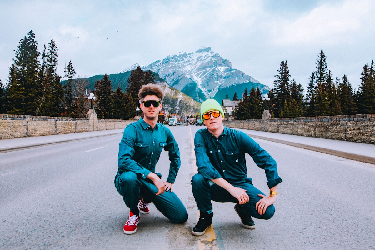 Skiitour in denim in the middle of a street in Banff