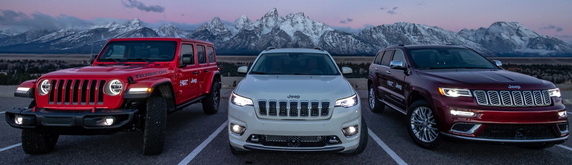 jeeps with mountains in background