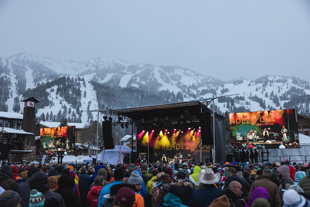 A zoomed out view of Rendezvous Spring Festival with mountains in background