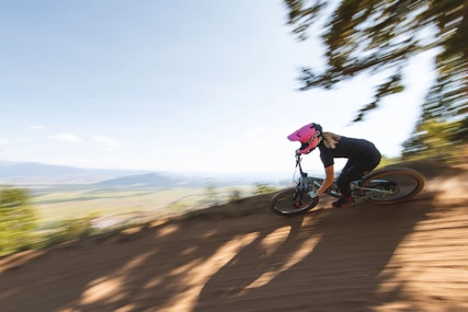 Riding on a berm in the bike park