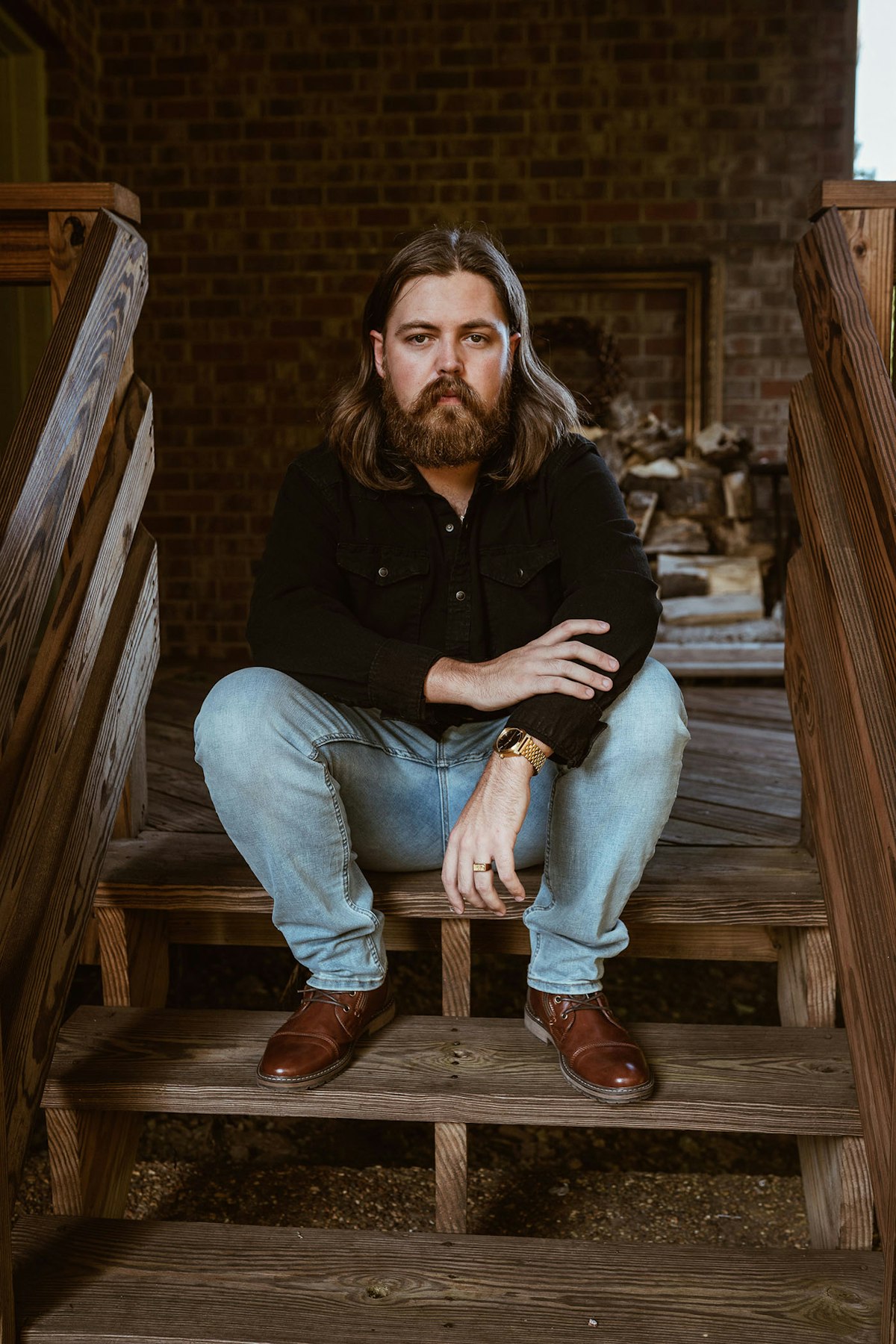 Drayton Farley sitting on stairs