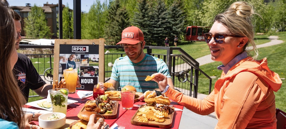 People eating a meal outside at RPK3