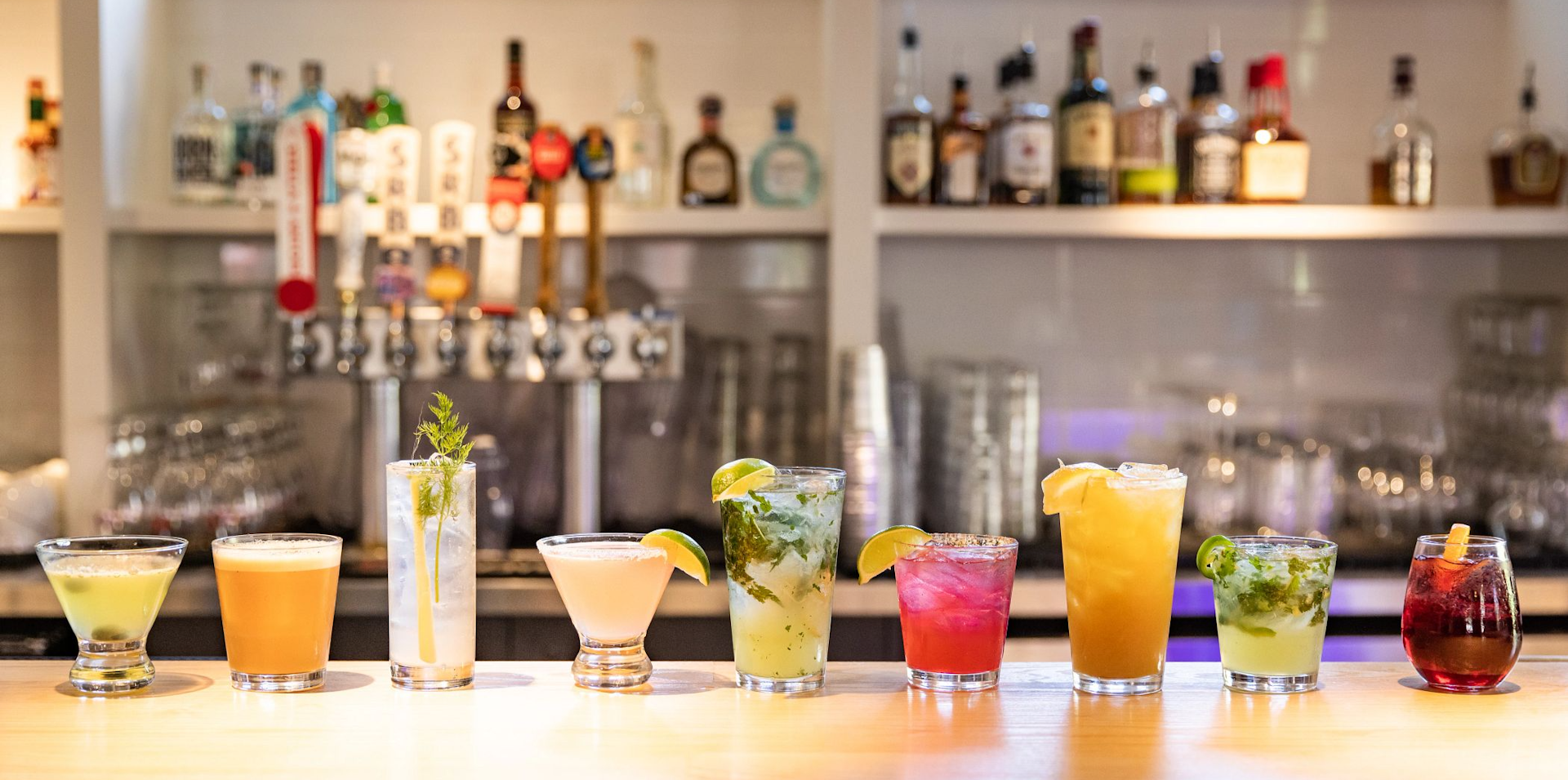 A lineup of cocktails on the bar at RPK3
