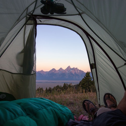 View of the Teton Mountain Range from inside a tent