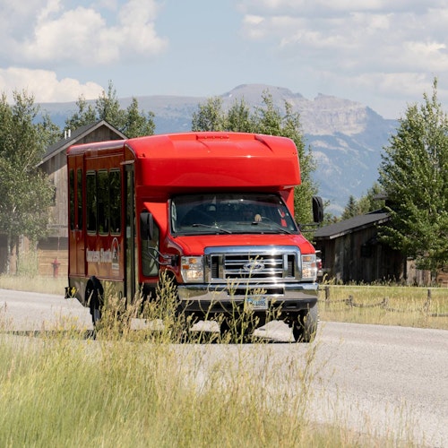 The Ranch Lot shuttle driving towards the base of the mountain