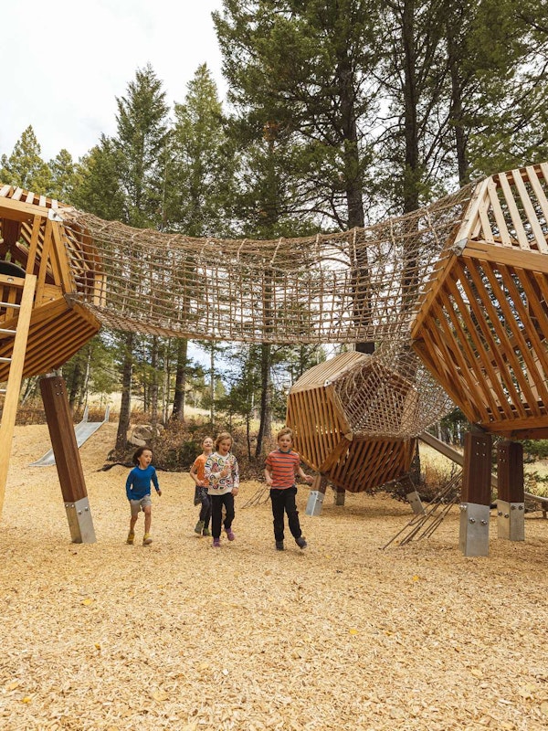 Kids running in the Wild Woods Playground