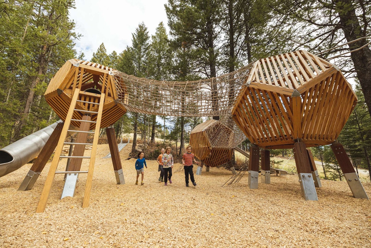 Kids running in the Wild Woods Playground